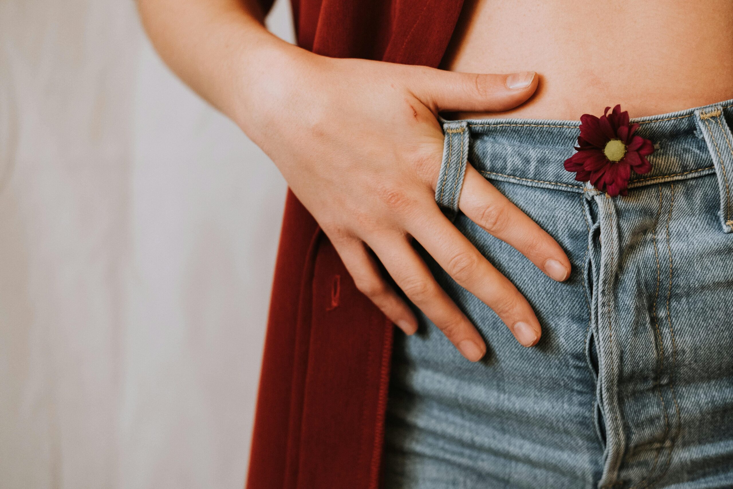 A person with a red flower.